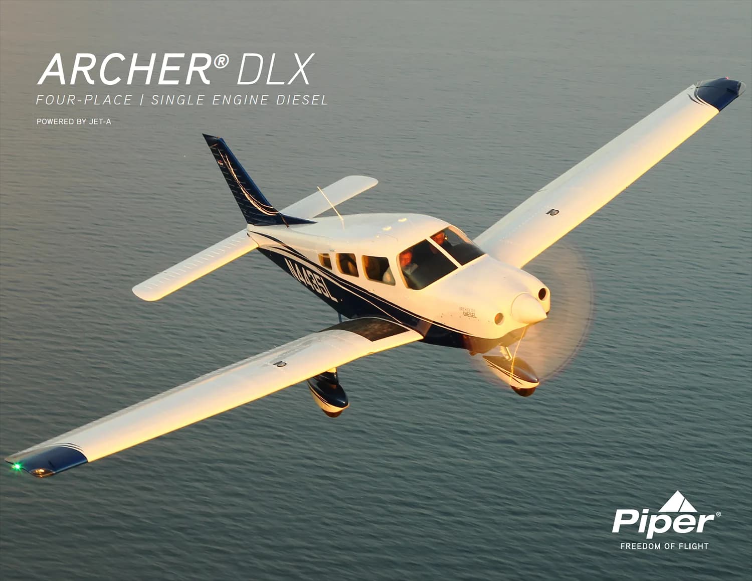 A Piper Archer DLX in flight over water.
