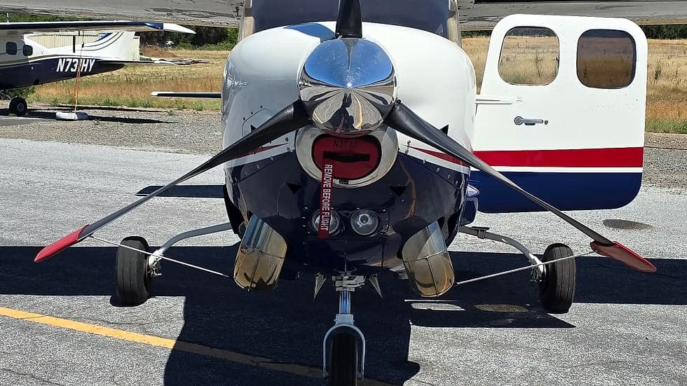 Front view of a Cessna 207A Turbo Stationair 800, registration N852S, with the propeller and nose visible.