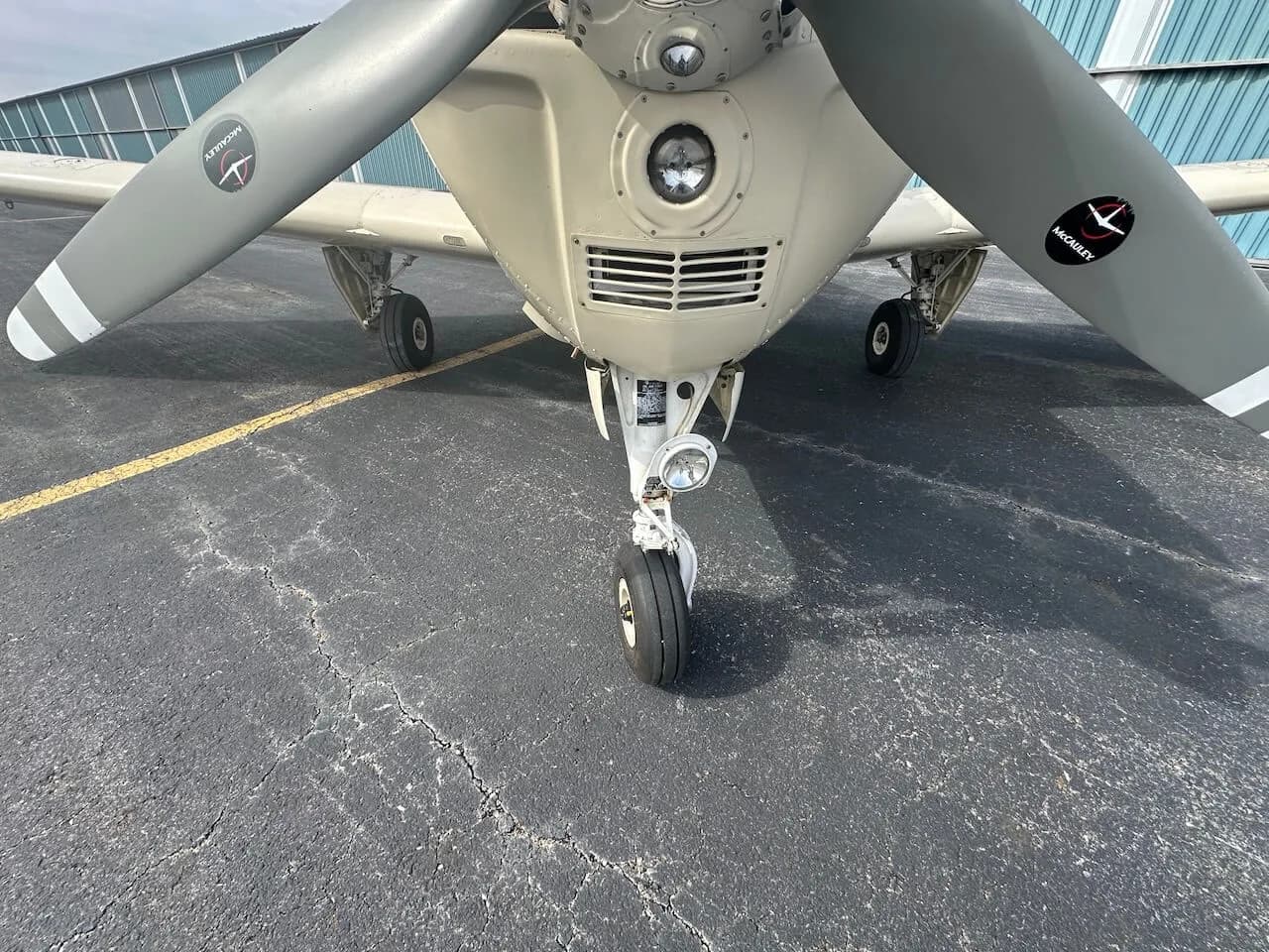 Close up view of the aircraft's nose and front landing gear.