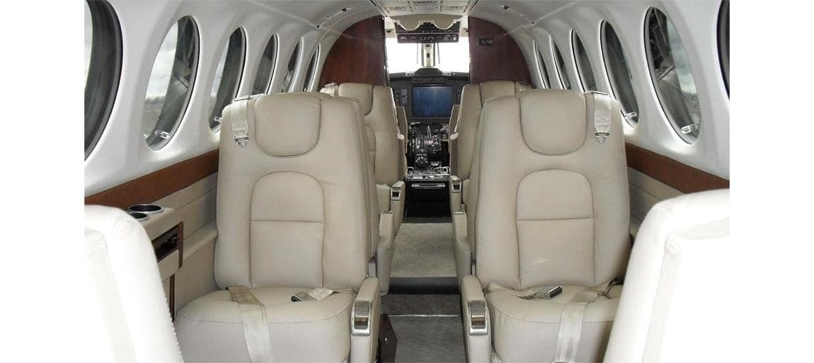 View of the Beechcraft King Air cabin with leather seats.