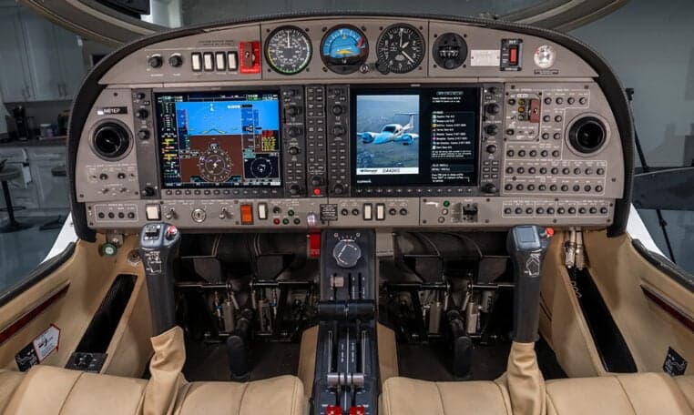 Cockpit view of the Diamond DA62 aircraft showing the instrument panel.