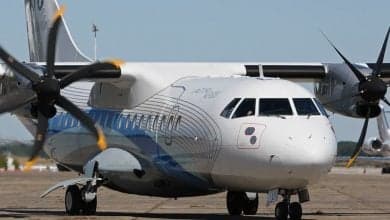 Close-up of an ATR 72 turboprop aircraft on the ground.