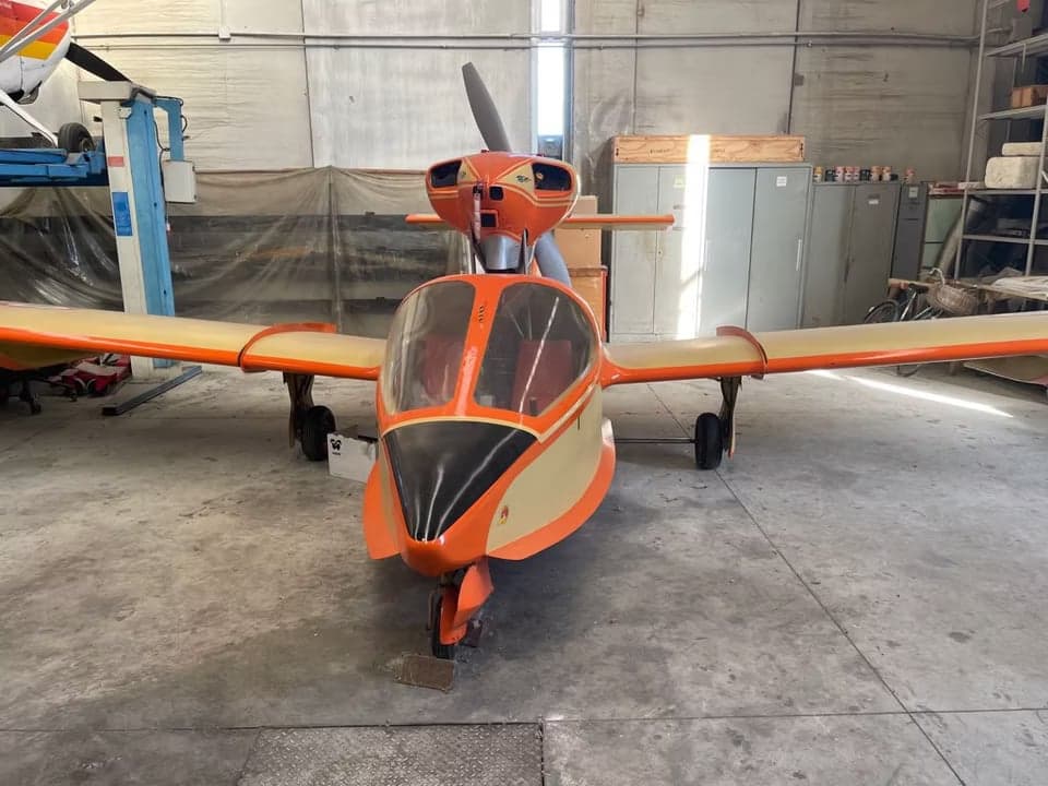 Front view of the I-PREY aircraft in a hangar.