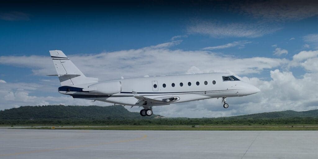 A Citation aircraft parked on the tarmac.