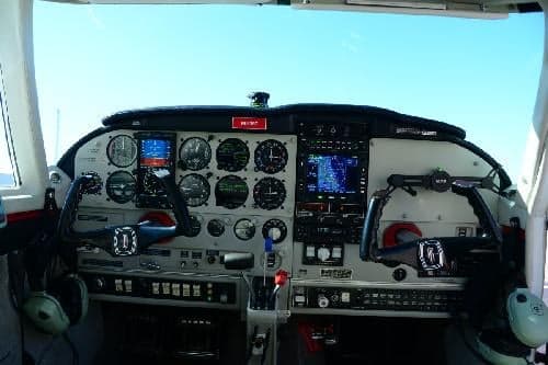 The aircraft's instrument panel features a variety of gauges and displays.