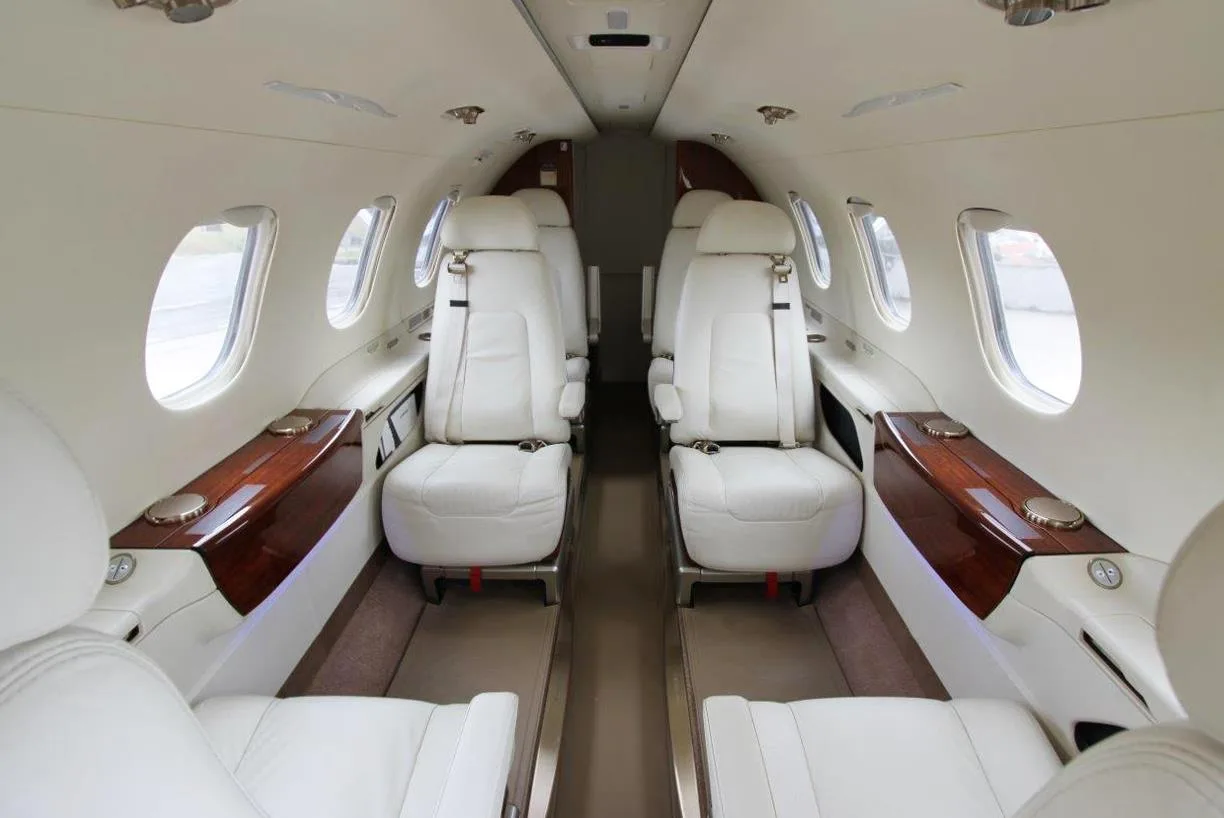 The Phenom 300E cabin features comfortable seating and a spacious layout.
