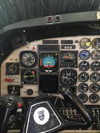 Close-up of the King Air aircraft cockpit instrument panel and yoke.