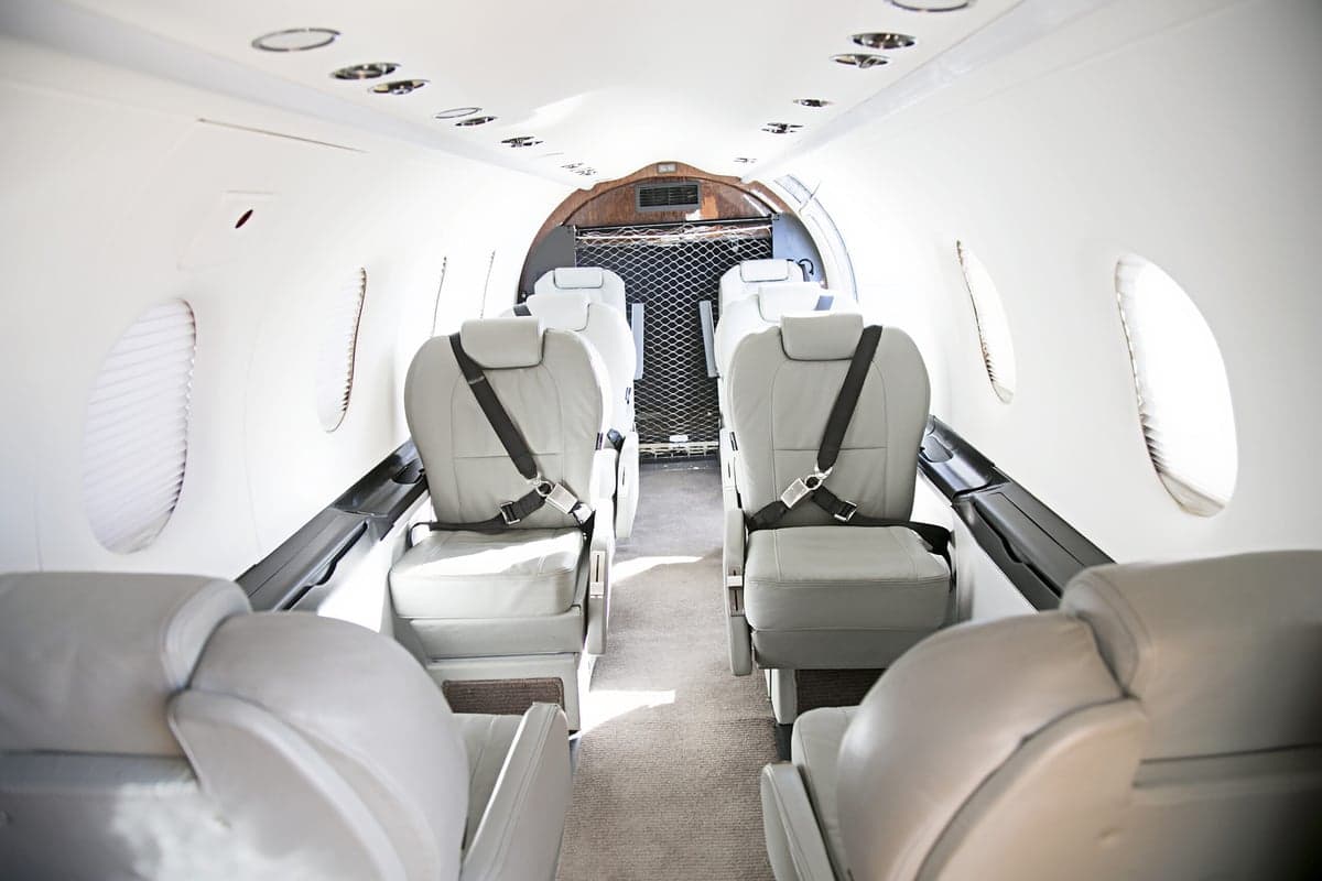 View of the interior cabin seating of the Pilatus PC-12 aircraft.