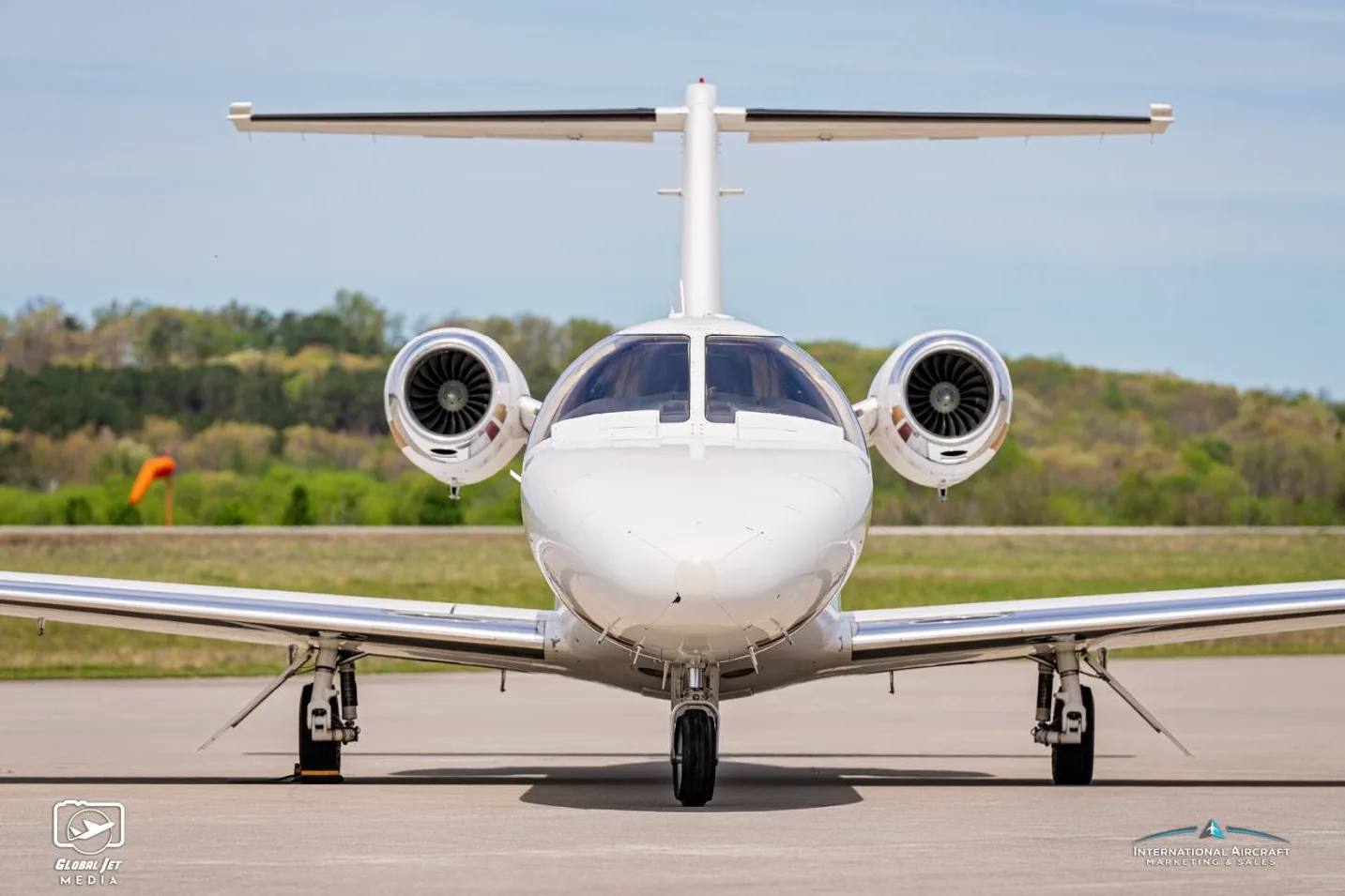 Front view of a Cessna Citation CJ1 with registration N525TF.