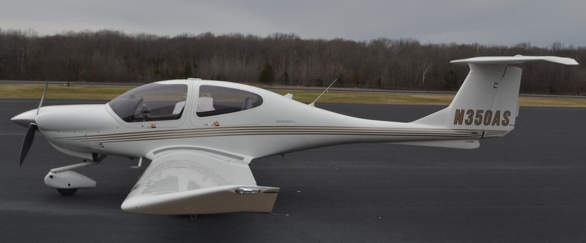 Diamond DA40 aircraft with registration N350AS on the tarmac.
