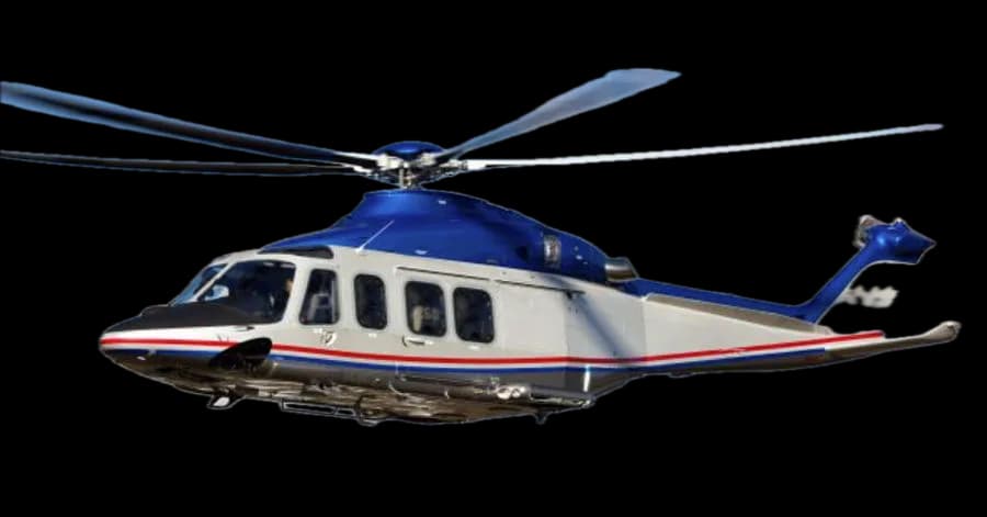 A blue and white helicopter with red and blue stripes, seen from the side with its main rotor blades spinning.