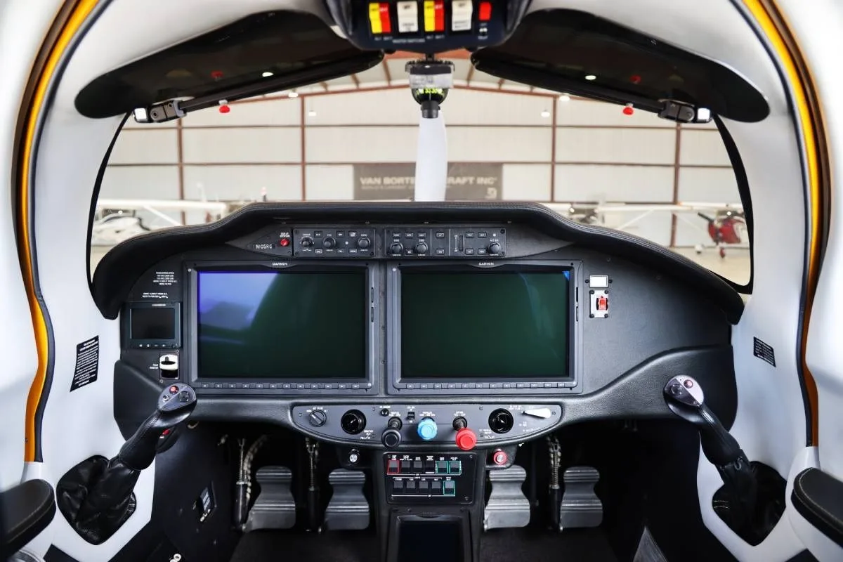 The cockpit of the Cessna TTx, featuring a modern glass panel with two large displays and dual side sticks.