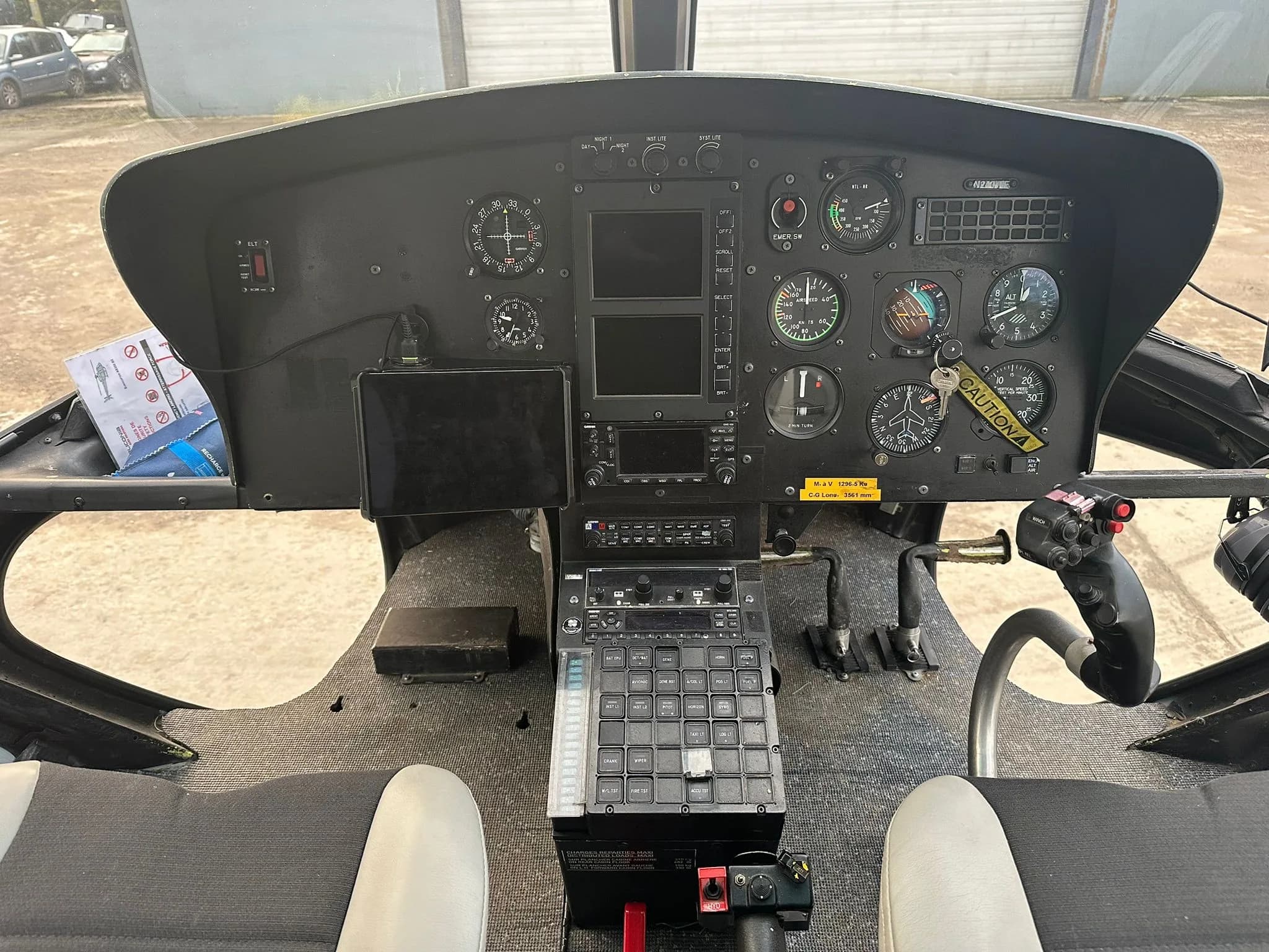 View of the helicopter's instrument panel and controls.