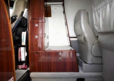 A storage cabinet and seat are visible in the Citation CJ3+ cabin.