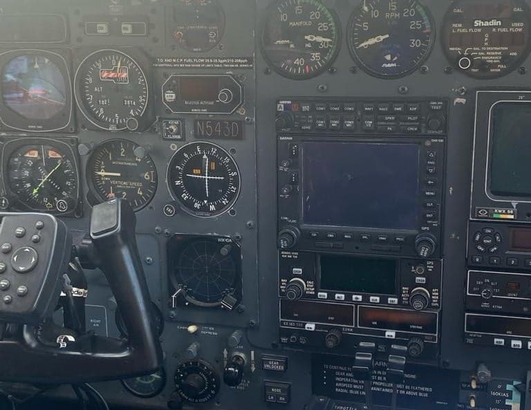 Close-up of the aircraft's instrument panel, showing various gauges and controls.