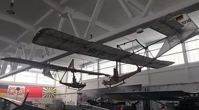 A vintage aircraft on display in a museum.