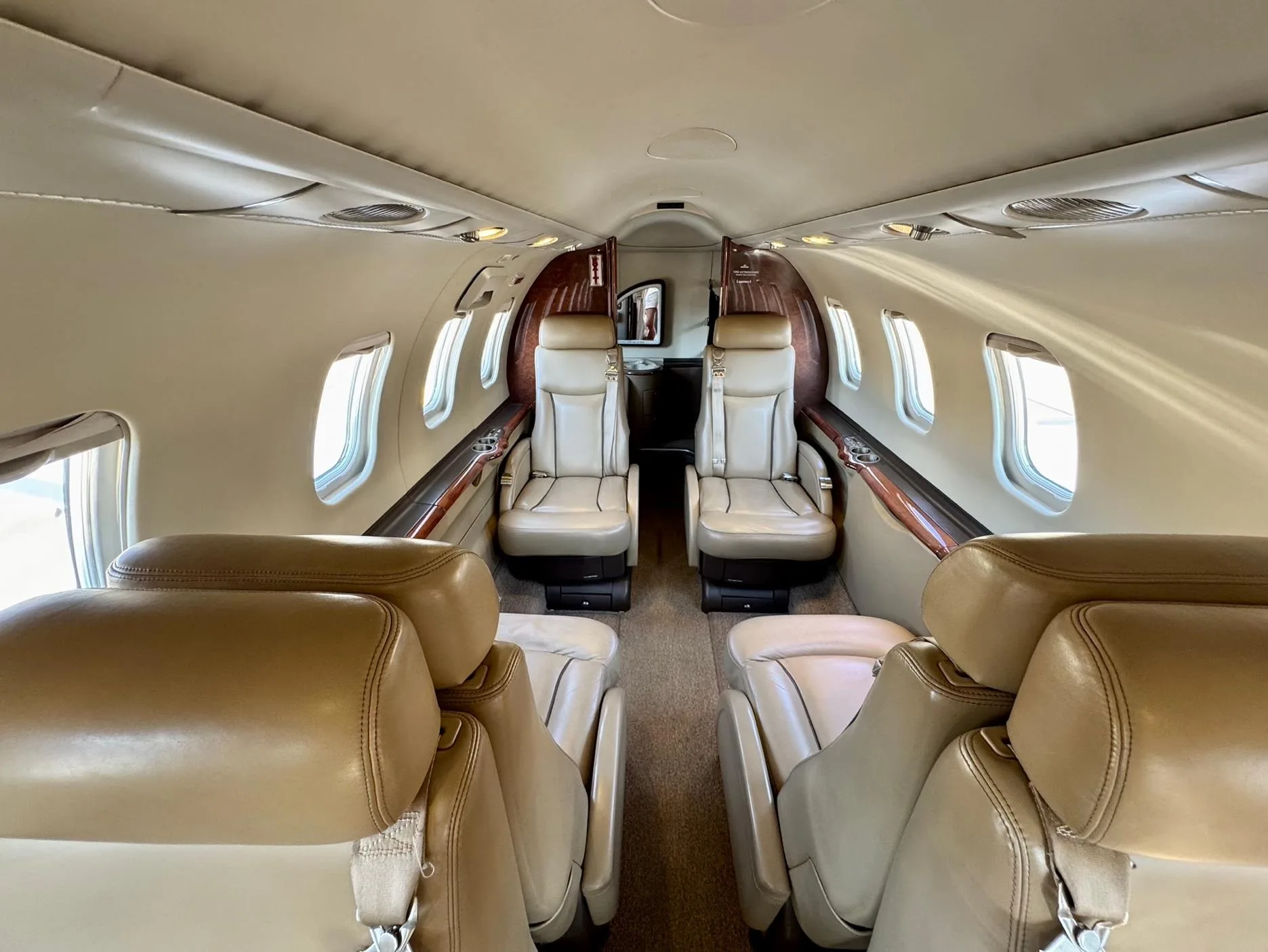 View of the aircraft interior with leather seats.