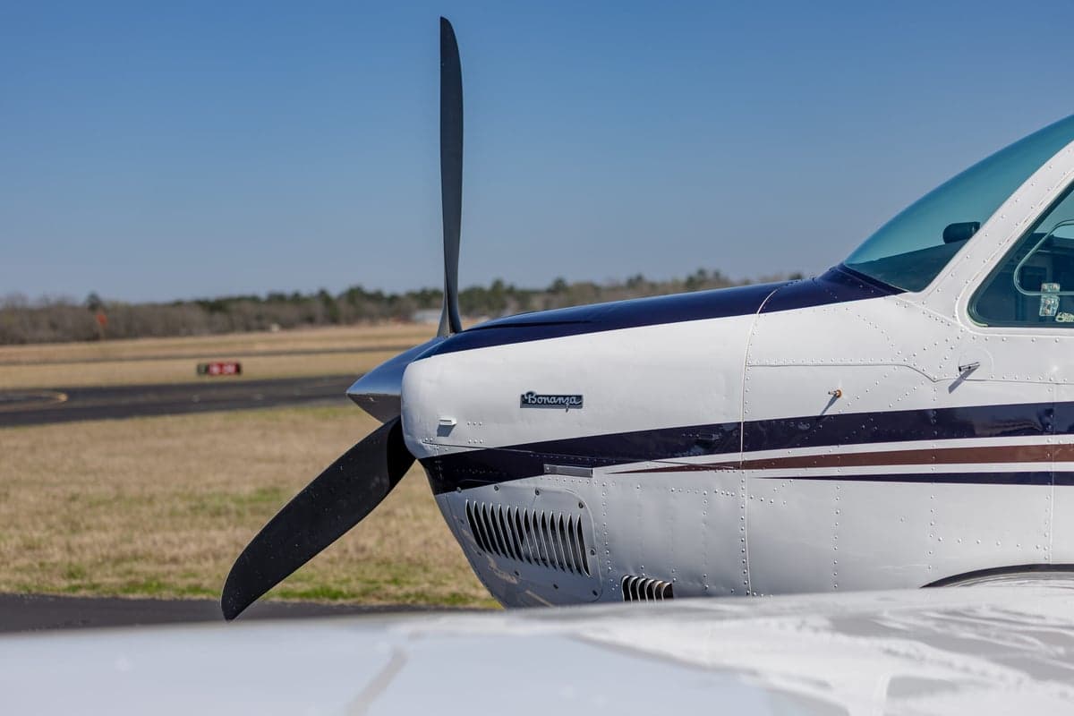 Close up of the front of the Beechcraft Bonanza N219DK showing the propeller.