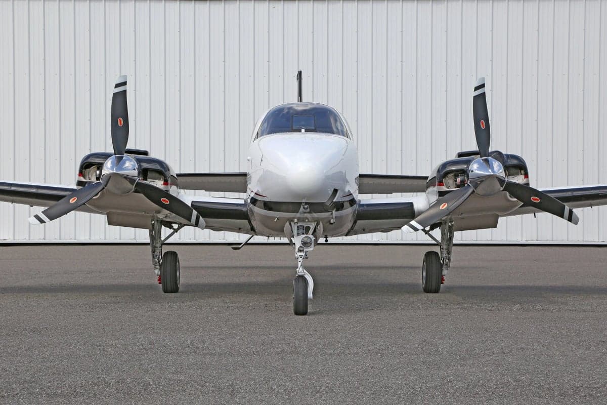 Front view of a Beechcraft Baron G58 aircraft on the ground.