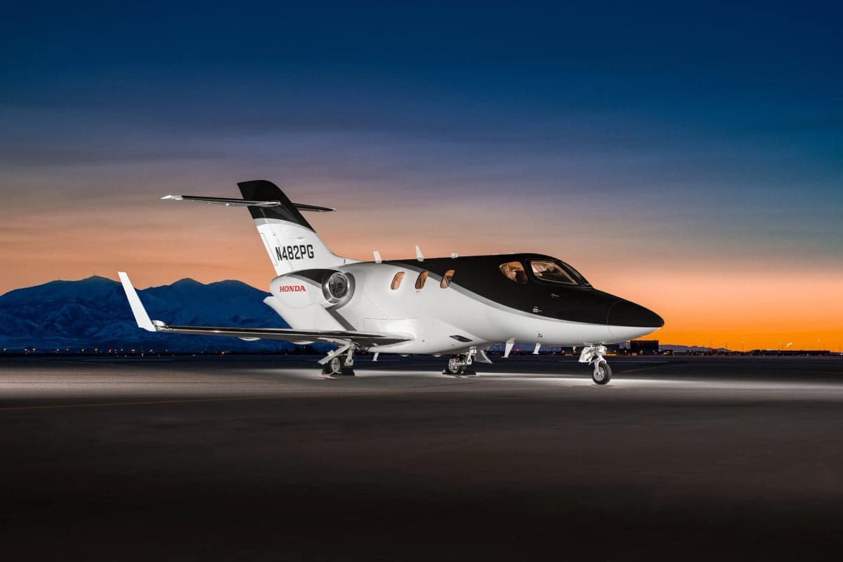 N482PG HondaJet on the tarmac at dusk, showing the tail number and Honda logo.