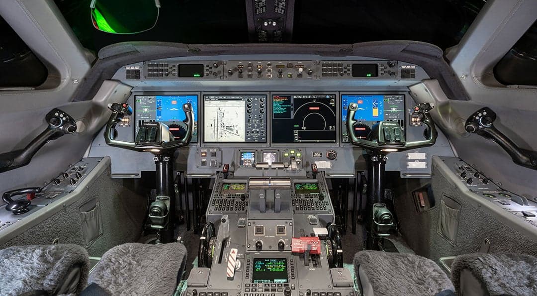 Full view of the Gulfstream G550 cockpit instrument panel and controls.