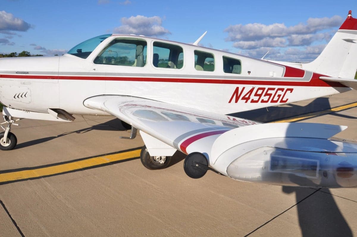 Close up of a Beechcraft Bonanza showing the N number N495GC.