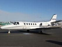 A Cessna Citation CJ1+ aircraft parked on the tarmac.