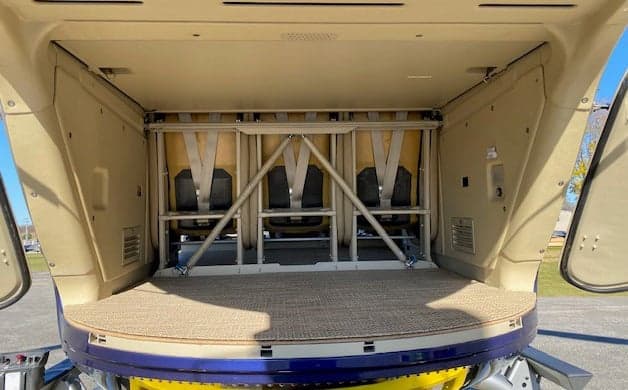 Interior view of the EC135 helicopter cabin with six seats.