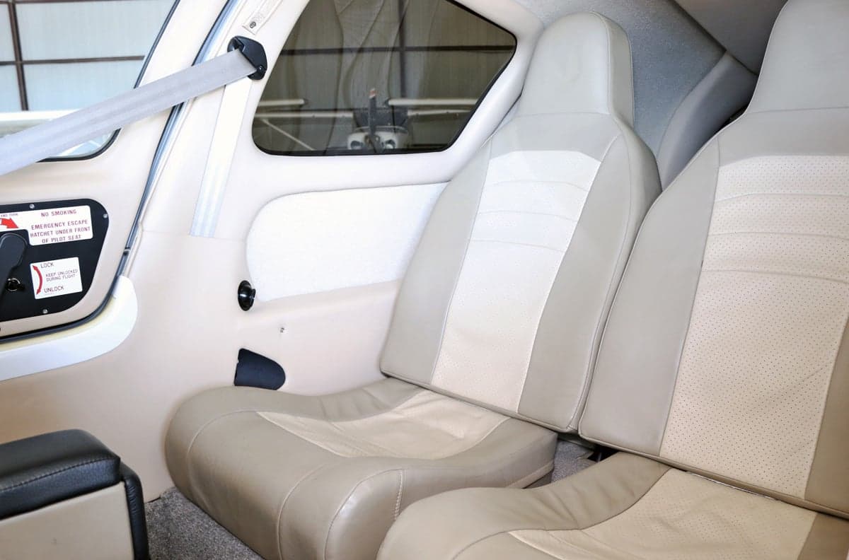 Interior view of the aircraft cabin showing the seats.