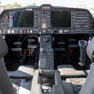 View of the cockpit instrument panel and center console of the aircraft.