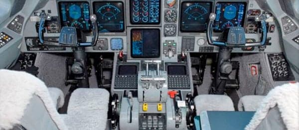 Full view of the Gulfstream G-IV cockpit with instrument panel and controls.