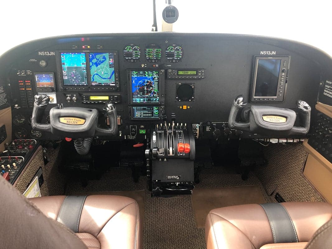 The cockpit of the N513JN aircraft features a modern instrument panel and controls.