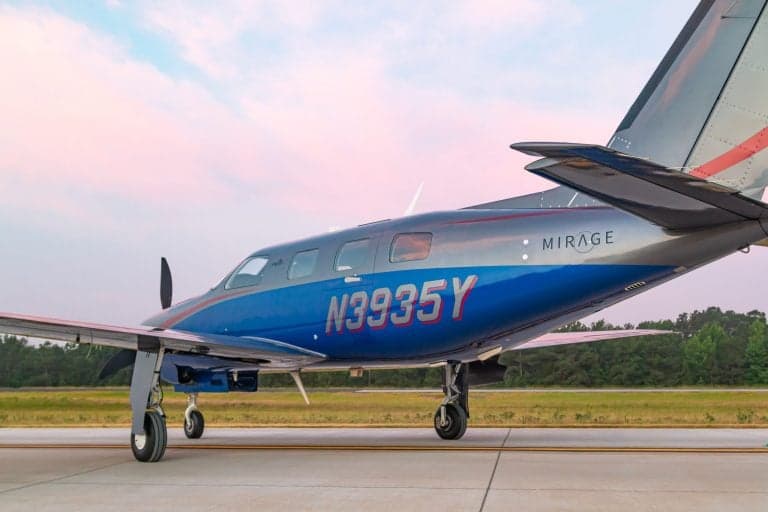 Close up of the tail and fuselage of Piper Mirage N3935Y.