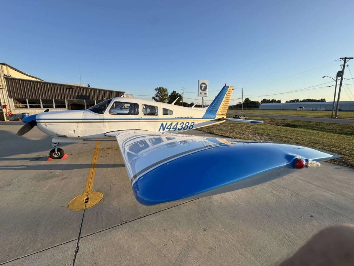 Side view of the Cherokee Arrow N44388 on the tarmac.