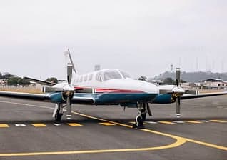 Citation CJ3 aircraft with registration N24PH inside a hangar.