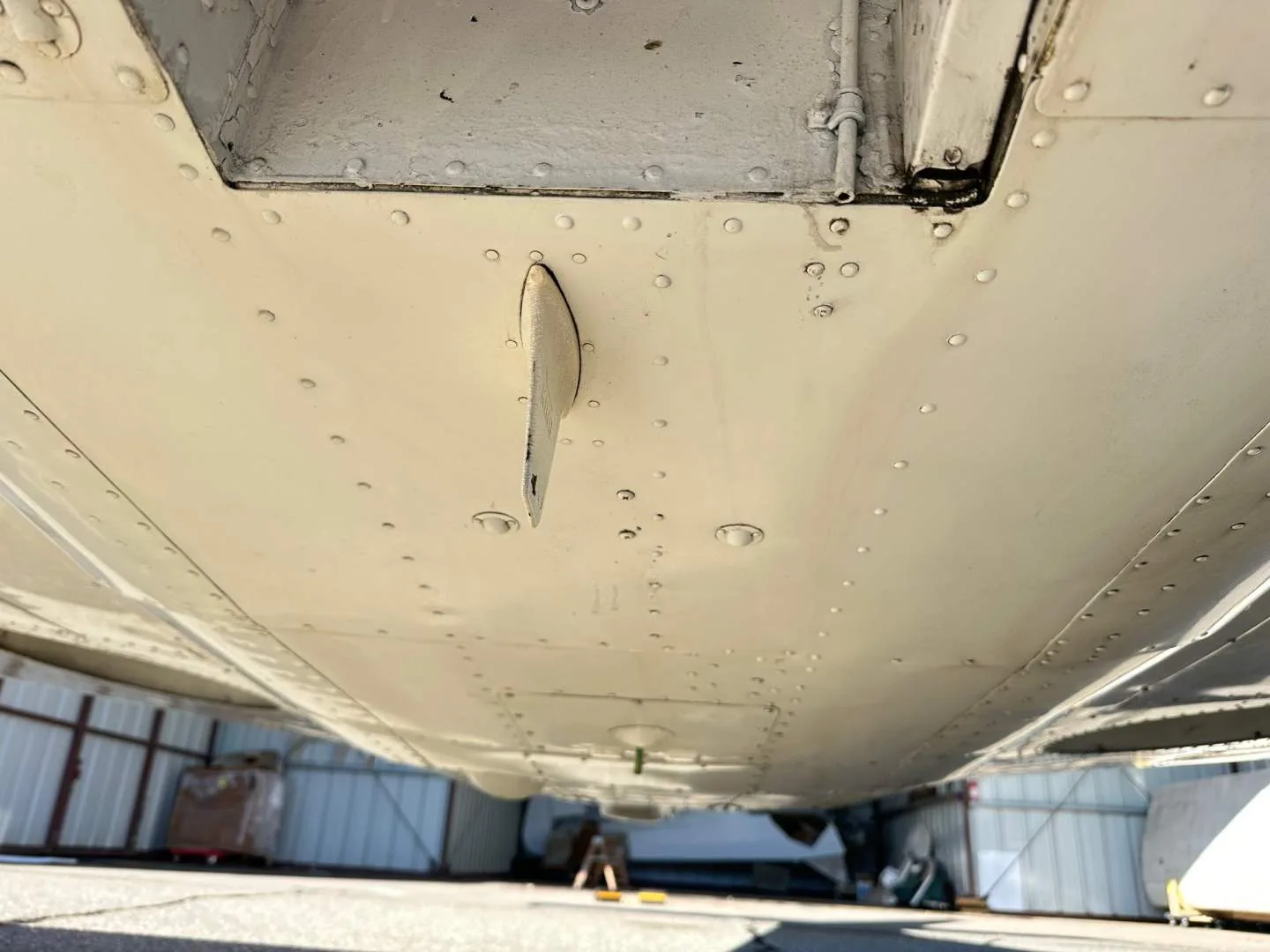 View of the underside of the N2947 aircraft wing.