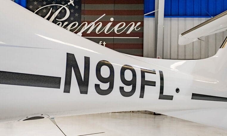 Close up of the tail number N99FL on a Diamond DA62 aircraft.