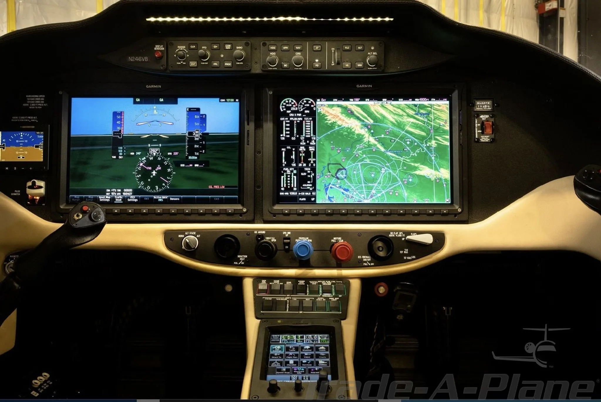 The cockpit of the Cessna TTx N246VB features a modern glass panel with two large Garmin displays.