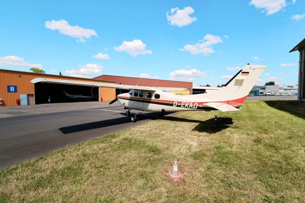 Close up of the D-EKAD Cessna aircraft nose and cockpit.