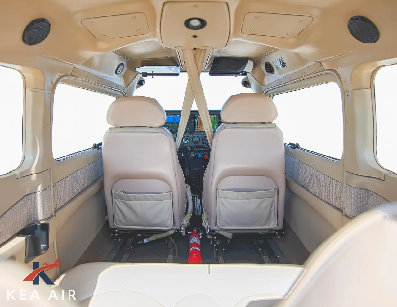 View of the cockpit from the rear seats of the aircraft.