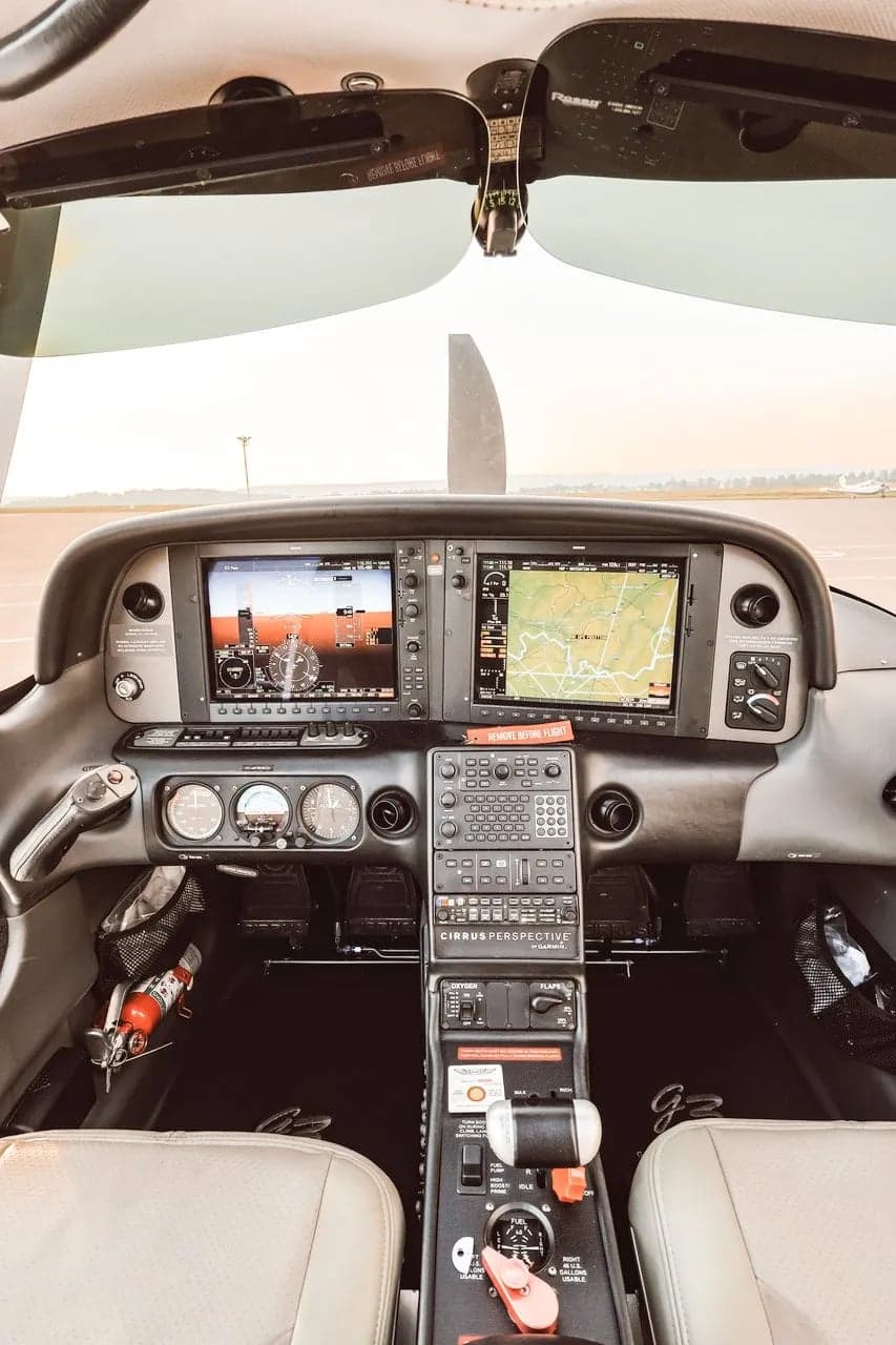 Cockpit view of the Cirrus aircraft instrument panel.