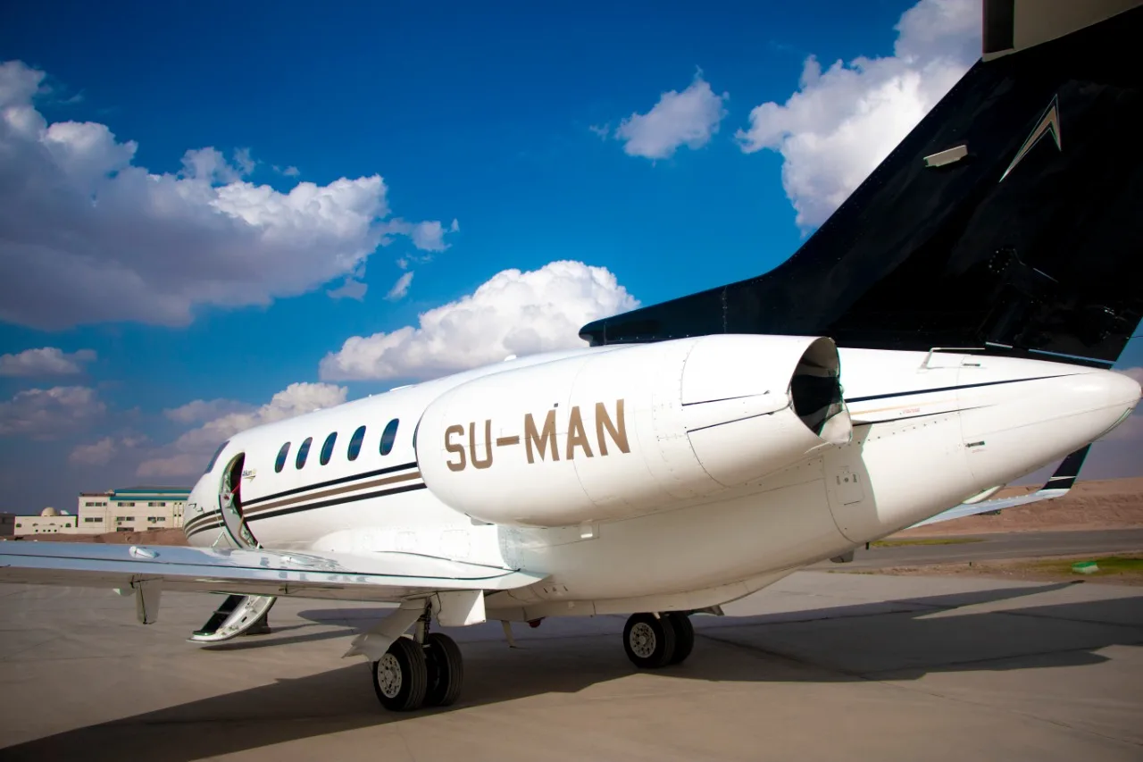 Rear view of the SU-MAN aircraft, showing the tail and engine.