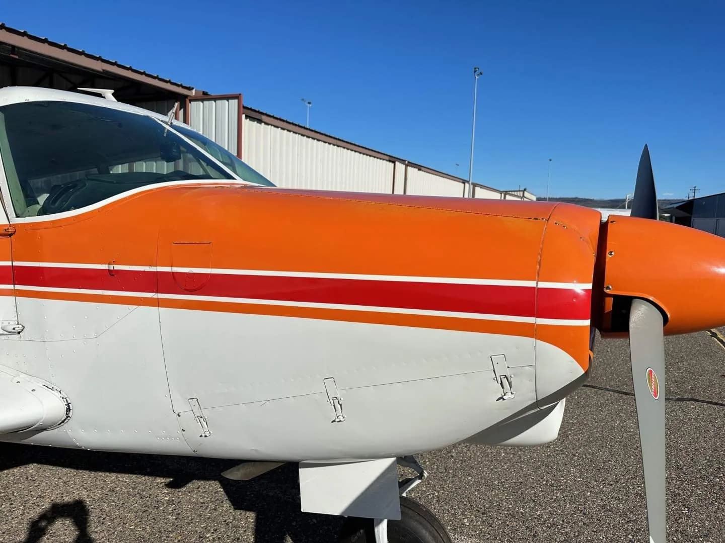Close up of the nose and propeller of the N2947 aircraft.