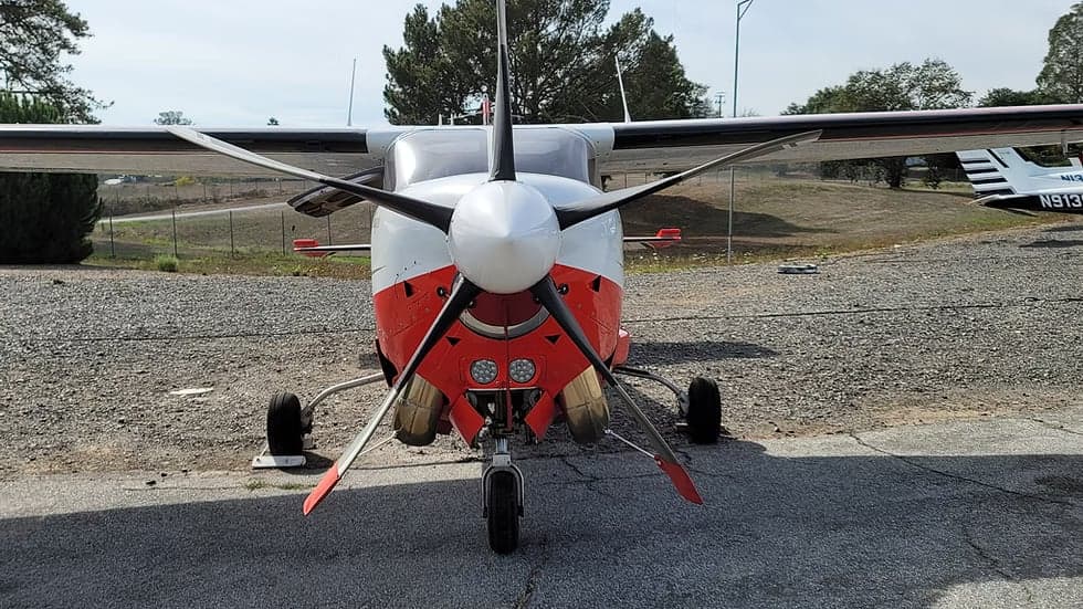 Front view of the N210NL Silver Eagle aircraft.