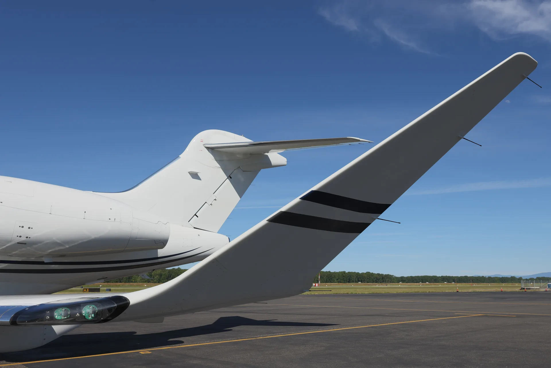 Close up of the tail of a Challenger aircraft.