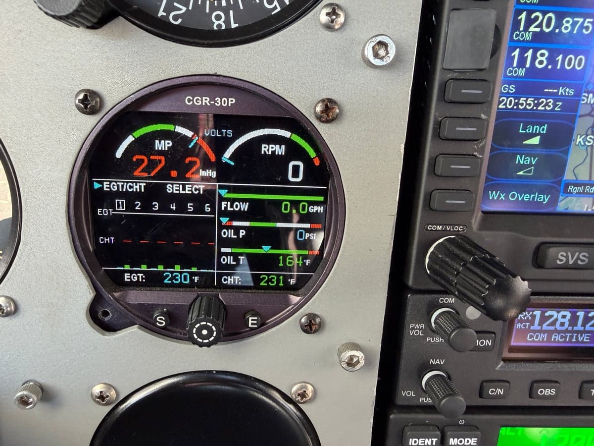 Close-up of the CGR-30P instrument displaying engine parameters in the N8268M aircraft's cockpit.