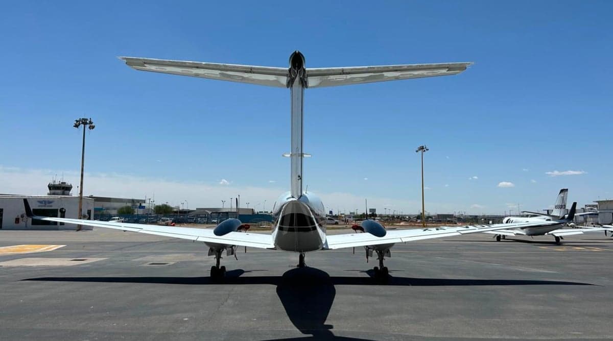 Rear view of a King Air 250 on the tarmac.