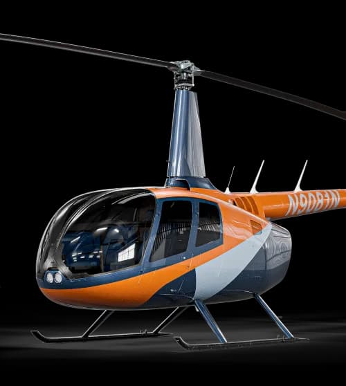Robinson R44 helicopter with orange, blue, and silver paint scheme.
