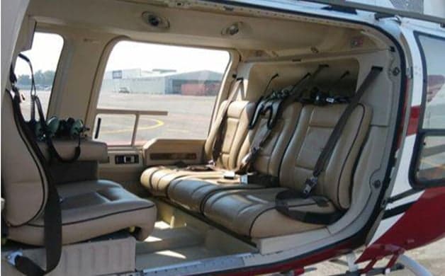 Instrument panel and controls of a helicopter cockpit.