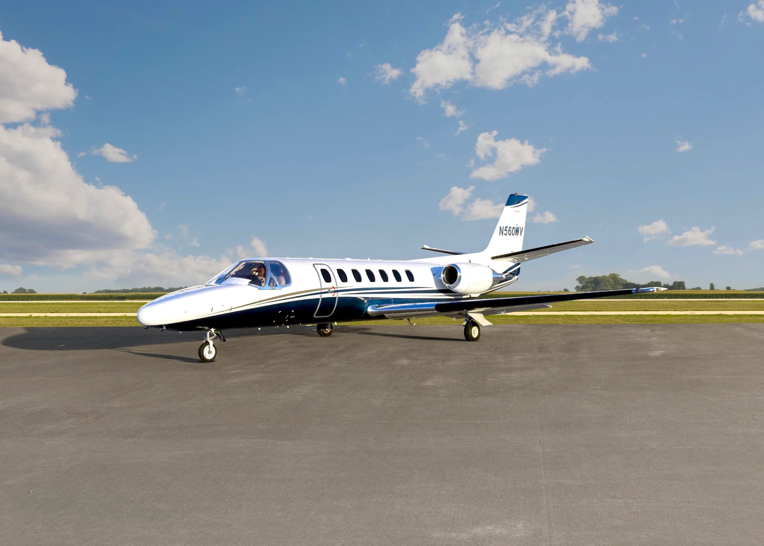 A Cessna Citation CJ1+ aircraft with registration N560WV on the tarmac.